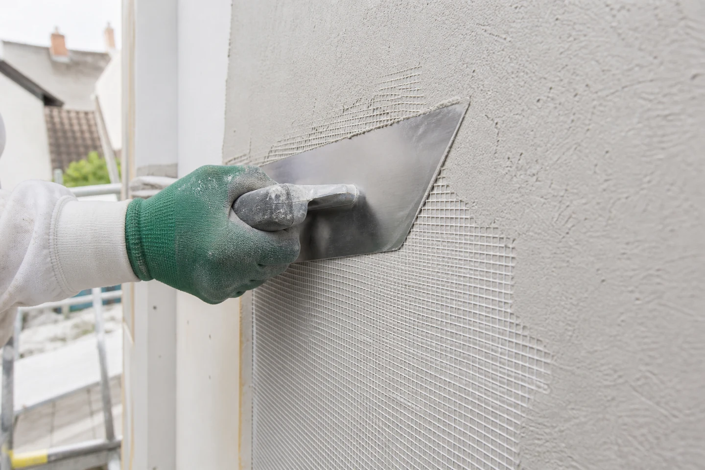 Incorporation du treillis dans la couche de base d’une ITE sous enduit